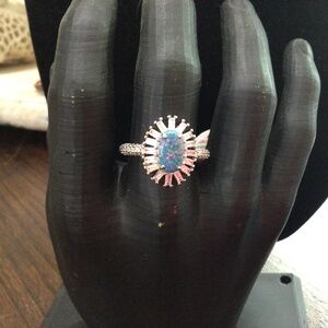 Bomb Party “ Sparkling Gaze” Lab created emerald fire opal. Rhodium plated.sz 10